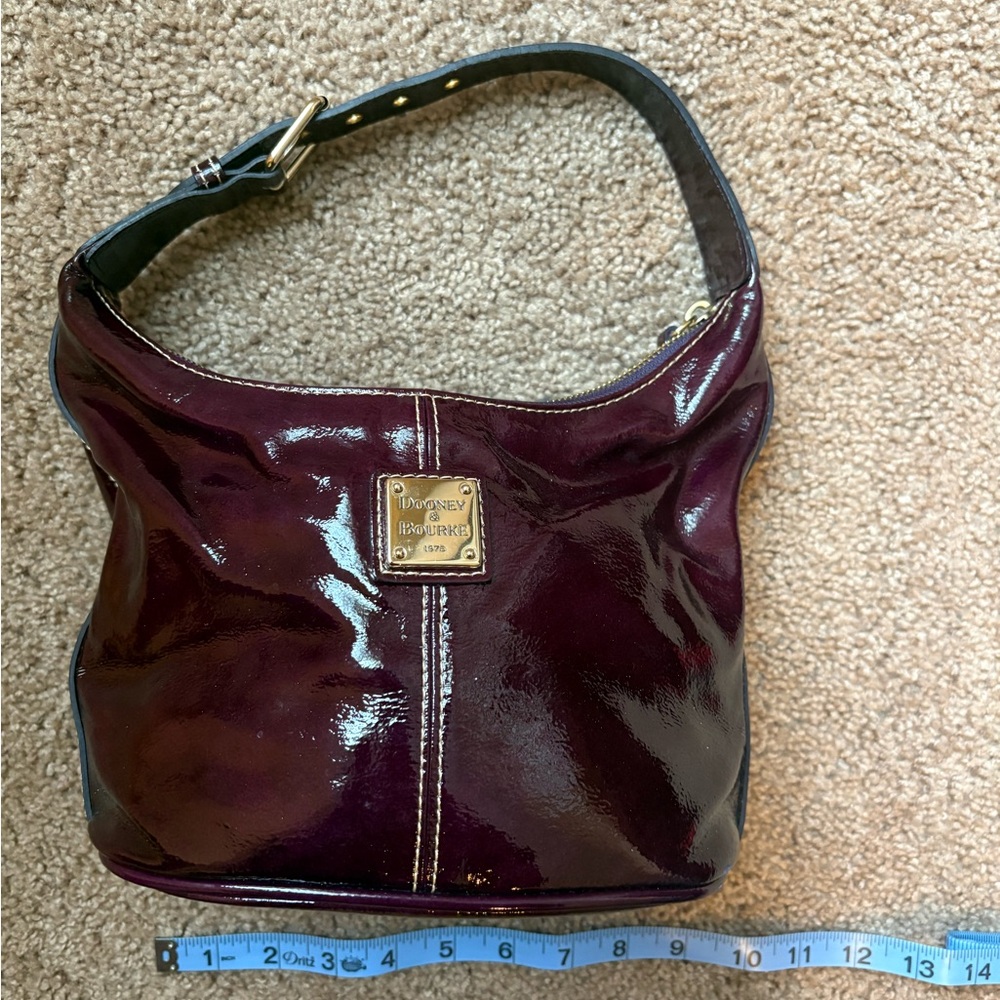 Dooney & Bourke Glossy Plum Patent Shoulder Bag with Gold Plaque